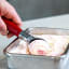 KitchenAid Coreline Ice Cream Scoop - Empire Red with ice cream