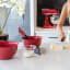 KitchenAid Universal Mixing Bowls, Set of 3 - Empire Red on the kitchen counter