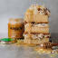 Waggle Spiced Craft Honey, 340g with a slice of cake
