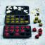 Blomsterbergs Silcone Chocolate Mould, Set of 3 - Grey on the table with chocolate treats