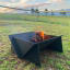Pretzel Fire Pit - Black on grass
