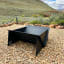Pretzel Fire Pit XL - Black on the ground