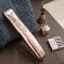Wahl Rechargeable Rose Gold Personal Grooming Kit on a towel