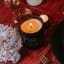 Coccolare Lux & Co Lime, Basil & Fig Filled Soy Candle, 300g on a dinner table