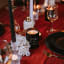 Coccolare Lux & Co Lime, Basil & Fig Filled Soy Candle, 300g on a dinner table
