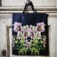 Hendrik Willem Purple Magnolia Botanical A4 Gift Bags, Set of 3 hung on a door knob