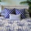India Ink Blue Zanzibar Palm Kantha Stitched Throw - Double on the bed