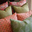 India Ink Peach Lemon Flower Pillowcases, Set of 2 on the bed