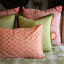 India Ink Peach Lemon Flower Pillowcases, Set of 2 on the bed