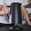 Swan Stealth Cordless Kettle, 1.7L handheld showing scale