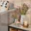 Thread Office White Frosted Raw Edge Candle Holder on side table with vases