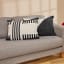 Thread Office Monochrome Woven Track Scatter Cushion with Feather Blend Inner, 50cm x 70cm on couch with other scatter
