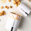 Snackadamia Gourmet Roasted Honey Flavoured Macadamia Nuts - 250g on the counter