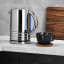 Dualit Architect Cordless Kettle, 1.5L - Grey with a cup and saucer 