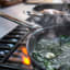 Joseph Joseph Space Ceramic Non-Stick Frying Pan with Folding Handle - 24cm on the stove