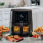 Kenwood Digital Airfryer with Grill Function and Clearcook Window, 9L with food on the table