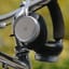 Bang & Olufsen H100 Beoplay Noise Cancelling Headphones - Infinite Black on a bicycle