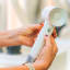 Laifen Swift High Speed Hair Dryer, 1600W - Pearl White showing scale handheld