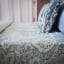 India Ink Blue Prince Paisley Kantha Stitched Throw - Double on the bed
