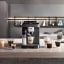 DeLonghi Magnifica Evo Next Bean to Cup Coffee Machine on the kitchen counter with coffee cups