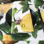 DSA Cotton Lemon Tablecloth - 6-Seater on the table with dinner plates