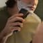 Philips 1000 Series Rechargeable Wet & Dry Electric Shaver on a man's chin