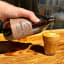 Doubleshot Coffee & Tea Natural Flavour Syrup - Vanilla Pod poured in coffee