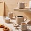 Maxwell & Williams Cafe Life Mug, 420ml - Sand set on the table