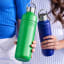 Le Creuset On The Go Vacuum-Insulated Stainless Steel Bottle, 500ml - Azure with a 1L Bamboo Green bottle