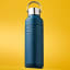 Le Creuset On The Go Vacuum-Insulated Stainless Steel Bottle, 500ml - Deep Teal on the table