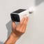 Eufy S220 2K UHD SoloCam Wireless Smart Security Camera Kit being adjusted on the wall