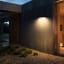 Litehouse Solar Outdoor Wall Light with Motion Sensor on the wall