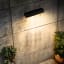 Litehouse Solar Outdoor Wall Light with Motion Sensor on the wall