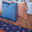 India Ink Rust King Paisley Kantha Stitched Throw - Double on the bed