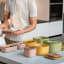 Guzzini Eco Store & More Deep Container, 750ml - Avocado green on the kitchen counter
