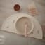 Mushie Silicone Placemat - Pink Flowers on the table