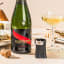 Dreamfarm Champagne Popper Cork Catcher on the table