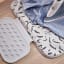 Joseph Joseph Swift Ironing Mat - Ecru Scatter with an iron