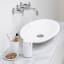 Brabantia ReNew Bathroom Accessory Set, 3-Piece - White next to the basin
