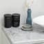 Brabantia ReNew Storage Pots, Set of 3 - Dark Grey next to the basin