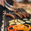 Masterbuilt Portable Charcoal Grill Cart with food