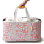 Joseph Joseph Hold-All Peach Collapsible Laundry Basket, 35L held on the handle