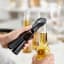 Joseph Joseph  BarStar 3-in-1 Corkscrew - Grey opening a beer bottle