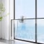 Ecovacs Winbot Mini Smart Window Cleaner on a window