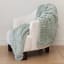 Linen House Arctic Snug Fur Throw, 150cm x 200cm - Mint Leaf on a chair