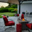 Alva Gas Fire Table with Lava Rocks & Lid by the patio