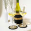 Gone Rural Trim Coasters, Set of 4 - Smoke & Black on the table
