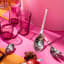 Olivia Princess Stainless Steel Salad Servers, Set of 2 - Pink on the table