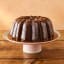 Jamie Oliver Big Love Stoneware Showstopper Stand, 31cm with a cake