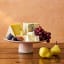 Jamie Oliver Big Love Stoneware Showstopper Stand, 31cm with fruits and cheese blocks